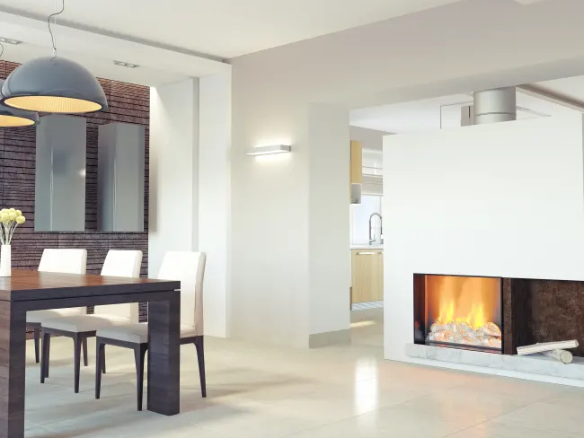 white wall with fireplace in a living room with light brown hardwood floor from Majestic Floors and More LLC in Waunakee, WI